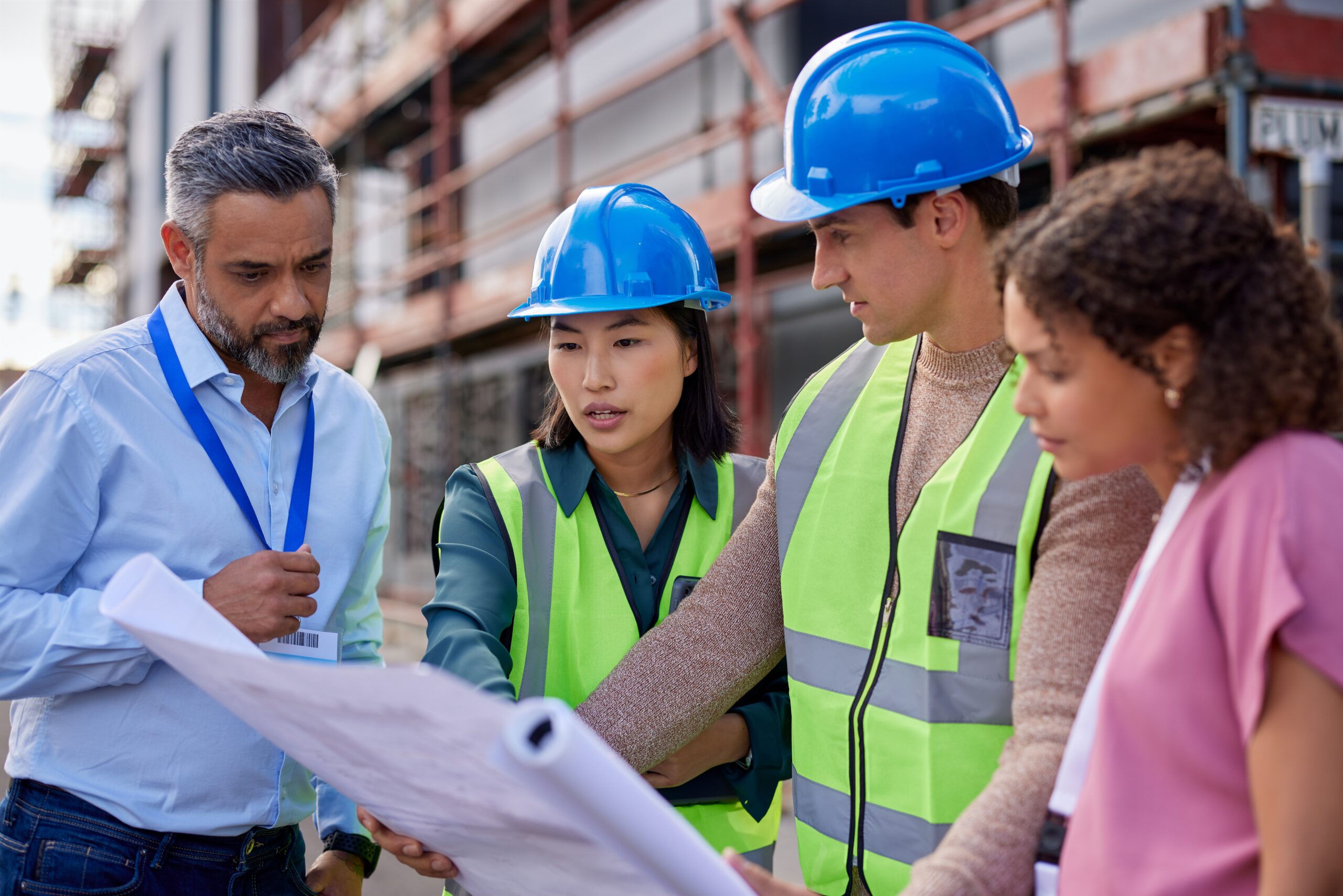 Contractor reviewing books and job costs